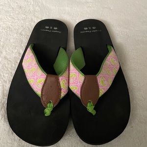 Seahorse size 8 woman’s flip flops.